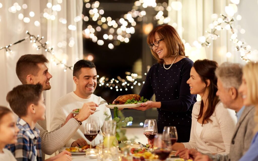 A family eating Thanksgiving dinner.