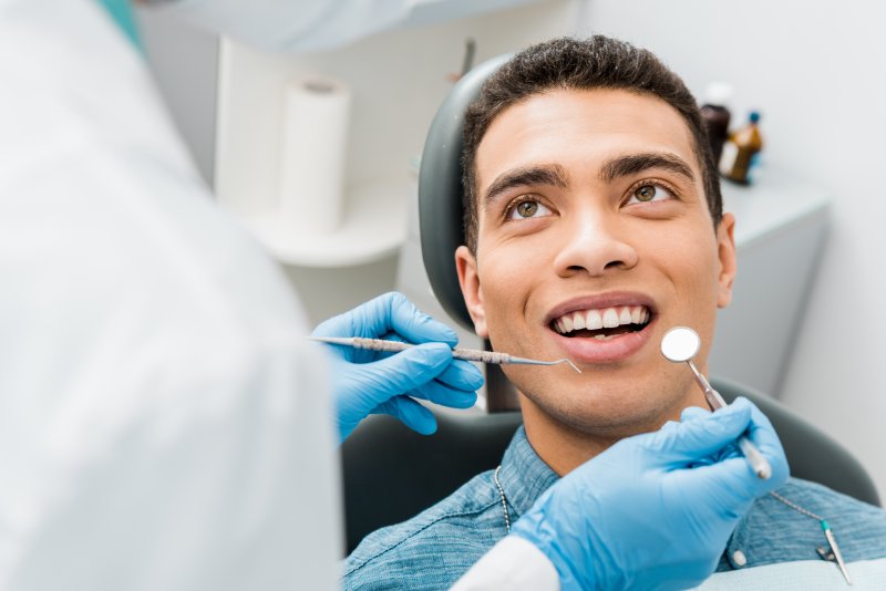 young man undergoing a dental checkup